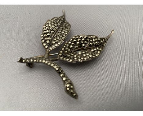 A vintage marcasite leaf brooch