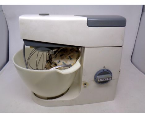 A vintage Kenwood electric food mixer,  with accessories.  CONDITION REPORT: In full working order. 