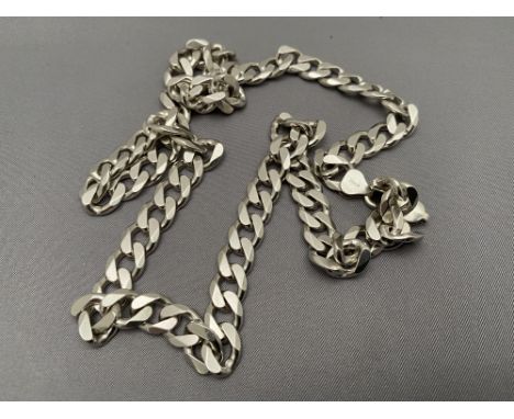 A silver curb chain, length 56cm CONDITION REPORT: 61g