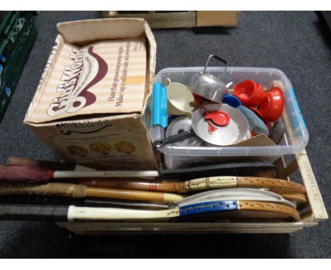 A box of vintage tennis rackets, girls make-up model, quantity of toy kitchen ware etc 
