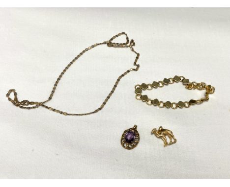 Two gold plated pendants and a chain and bracelet 