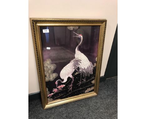 A Japanese print depicting storks, 45cm by 64cm
