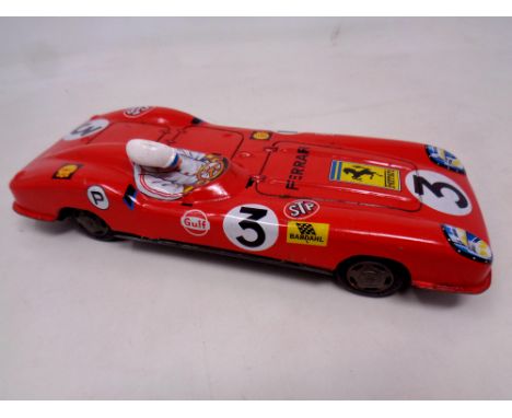 Vintage Sanko Ferrari tin plate model toy car measuring 9 inches in length 