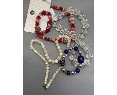 An M&amp;S collection necklace and bracelet set together with two further costume necklaces and a bracelet 