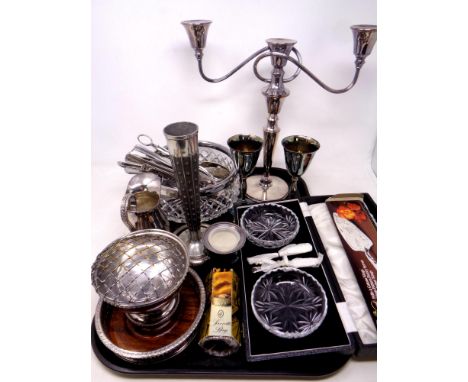 A tray of assorted plated and metal wares to include four piece table candelabra, goblets, rose bowl, wine coaster, cut glass