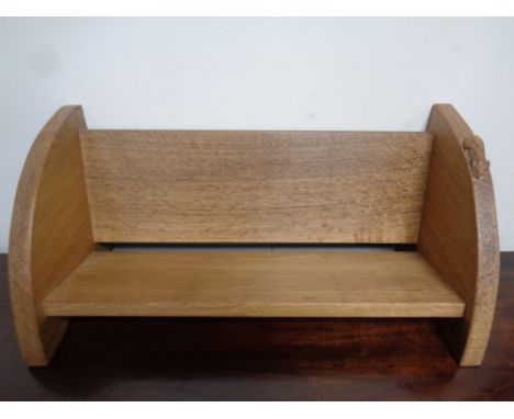A Robert 'Mouseman' Thompson of Kilburn oak book trough, with carved mouse signature, length 45 cm.