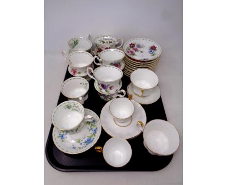 A set of twelve Royal Albert flower of the month series bone china teacups and saucers, two further Royal Albert Vald'or tea 