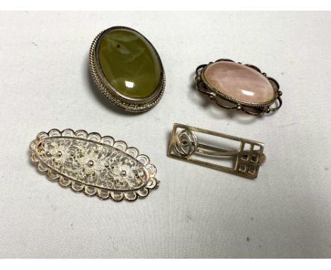 Four vintage silver brooches 