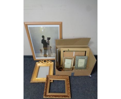 A Jack Vettriano print together with a box of assorted picture frames, photo frames