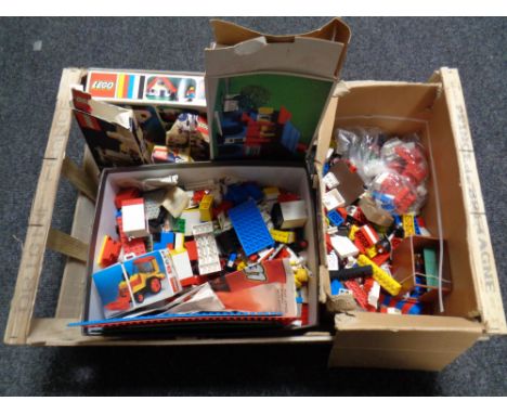 A crate of vintage lego and lego boxes 