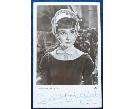 Postcard, Autograph, a good signed portrait photo of Audrey Hepburn in character. Photo - Ponti de Laurentiis film. Berlin Te