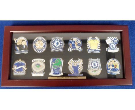 Football, Chelsea FC, a framed display badge set 'Chelsea FC - Decade of Dominance' 2005-2015 containing 12 enamel badges cel