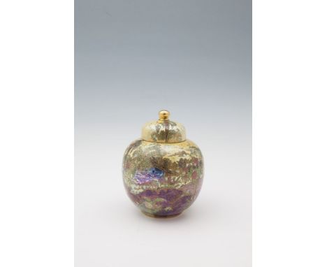 A WILTON WARE LUSTRE JAR AND COVER, c.1920’s of globular form, the domed cover with gilt knobbed finial, and decorated with c