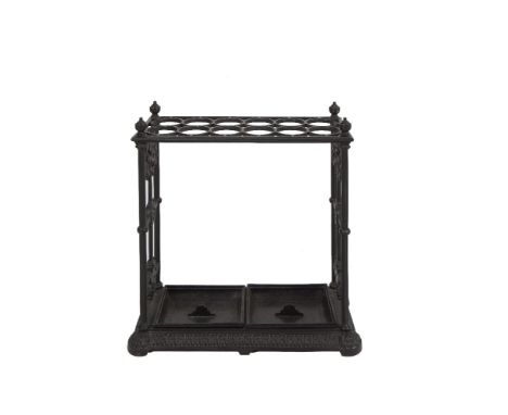 A VICTORIAN CAST IRON TWELVE RING STICK STAND, by Coalbrookdale, c.1870, of upright rectangular form, with raised finials to 