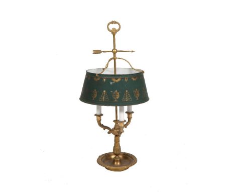 A FRENCH GILTMETAL BOUILLOTE LAMP, in Louis Seize style, with raised loop handle and mounted arrow above a green tole painted