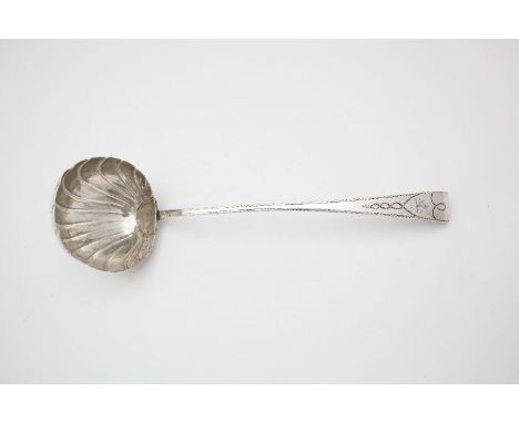 A LARGE IRISH GEORGE III SCALLOP FORM SERVING LADLE, Dublin c.1778, marks rubbed, no makers mark, the tapering handle with br