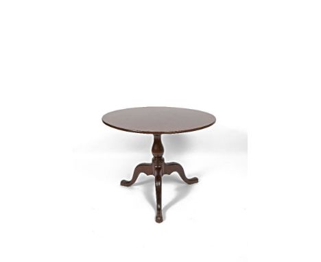 AN IRISH GEORGE III MAHOGANY TILT-TOP SUPPER TABLE, C.1760 the solid circular top supported on a baluster turned centre colum