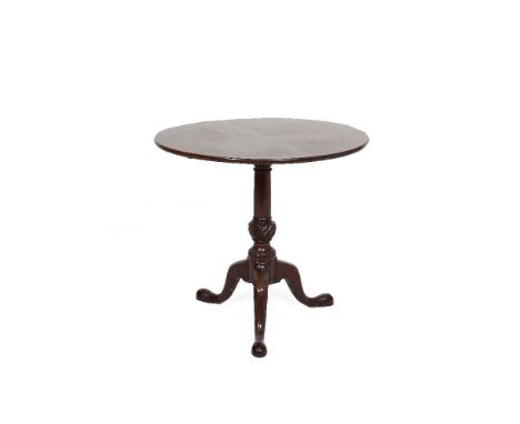 A GEORGE III STYLE MAHOGANY CIRCULAR SNAP TOP SUPPER TABLE with plain moulded rim and raised on turned centre-pillar tripod s