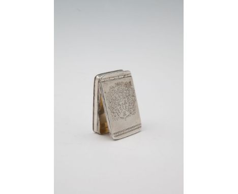 AN EARLY 18TH CENTURY SILVER RECTANGULAR SNUFF BOX, probably English, with hinged lid, engraved with a coat of arms, and two 