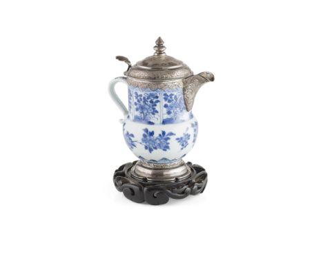 BLUE AND WHITE SILVER-MOUNTED MILK JUG AND COVERKANGXI PERIOD, THE MOUNTS DUTCH painted with a broad band of floral sprigs, b