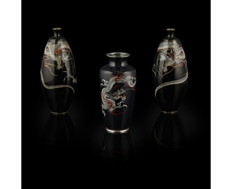 THREE CLOISONNÉ ENAMEL 'DRAGON' VASESMEIJI PERIOD each enamelled with a ferocious writhing dragon against a black ground (3)h