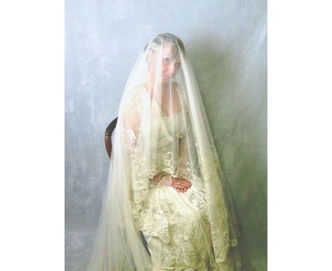 A late 1930s Isobel Wedding dress in brocade with a hand embroidered veil and a later Spanish lace cloak, in original Isobel 