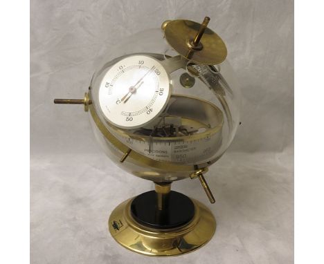A Huger Sputnik ES weather station, West German, incorporating a barometer, thermometer and hygrometer in brass and stainless