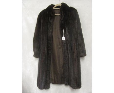 A dark ranch Mink coat
