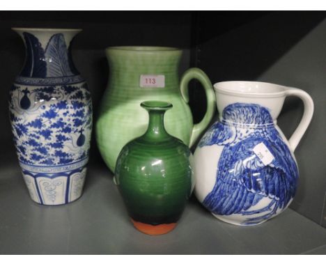 A selection of vintage ceramic jugs and vaseAll good apart from blue and white jug has hairline crack to base