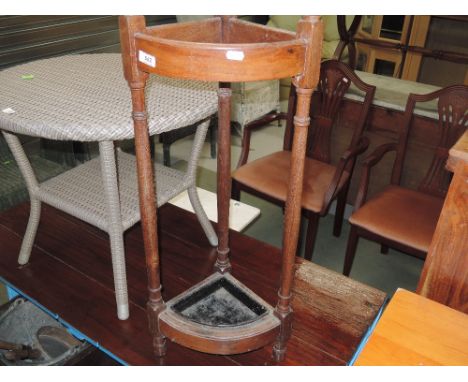 An early 20th Century mahogany turned frame stick stand