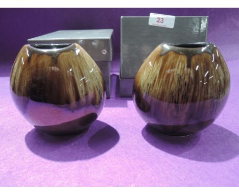 Two vintage ceramic vase by Poole Pottery in a lustre glaze