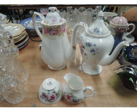 A selection of vintage ceramics including teapots and milk jug