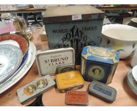 A selection of vintage advertising tins, Smiths Potato crisps, etc