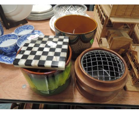 A selection of vintage ceramic planters and treen censer and agate style games board