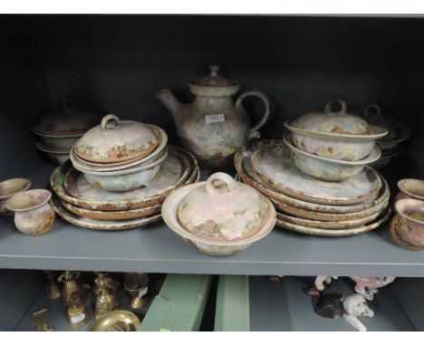 A shelf of Studio Pottery tableware from Middleton Stoney pottery