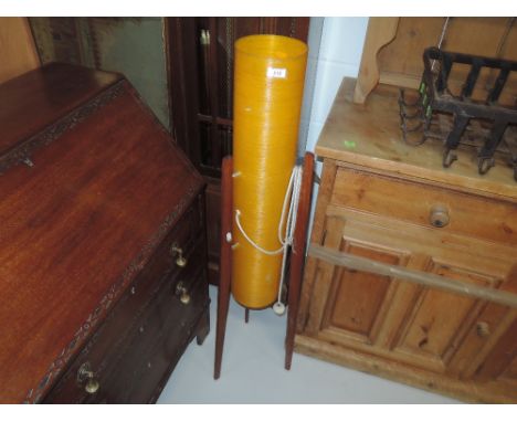 A vintage teak and fibre glass 'rocket' lamp
