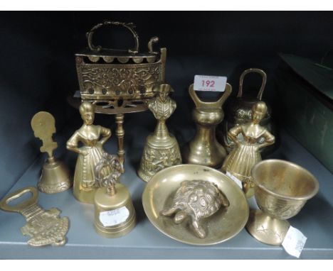 A selection of vintage cast brass bells ringers and similar