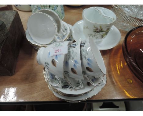 A part Colclough tea service and a moustache cu