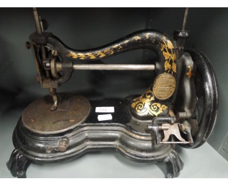 A vintage sewing machine with cats back design of local interest Thomson's Sewing Machine Depot Lowther St Kendal