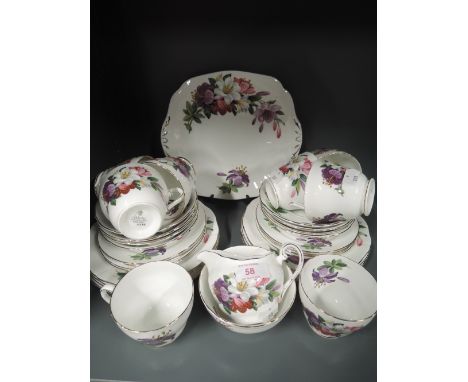 A vintage tea service by Adderley fine bone china pat no H 502