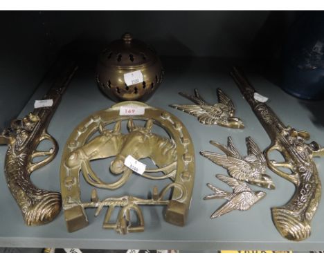 A selection of vintage brass wall decorations