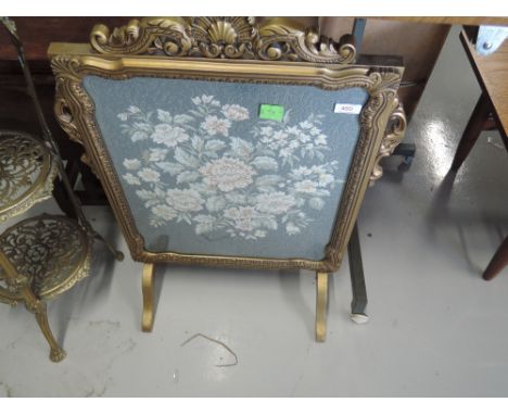 A vintage tapestry style firescreen in gilt frame