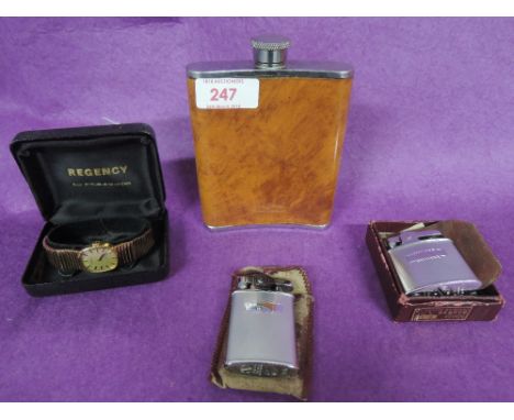 Two vintage cigarette lighters, a ladies Regency wrist watch and a hip flask