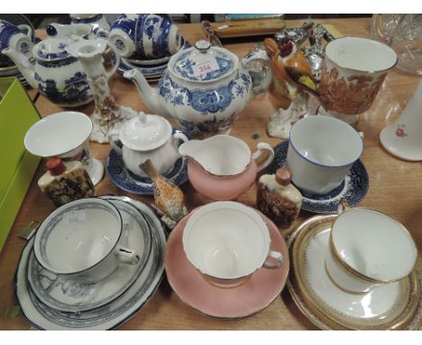 A selection of ceramics including Royal Worcester bird figure and Limoges candle stick etc