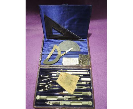A boxed geometry set some with bone handles