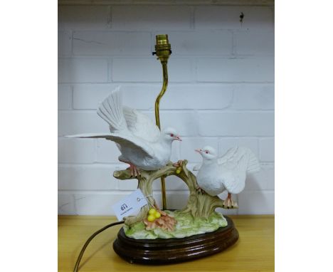 A Capodimonte Doves table lamp on polished wood base, size excluding light fitting 38cm high