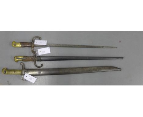 French bayonets to include a Chassepot sword bayonet and scabbard together with two Epee bayonets, one with scabbard (3) 