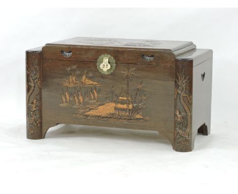 A Chinese carved camphor wood trunk
