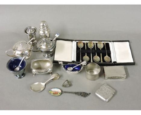 A collection of silver and plated items, including a carved set of six silver coffee spoons, a matchbox holder, a baby's spoo