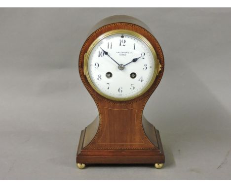 An Edwardian mahogany balloon mantel clock, inscribed Arle & Son, Leeds, 25cm high